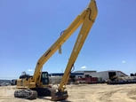 Front of used Excavator in yard